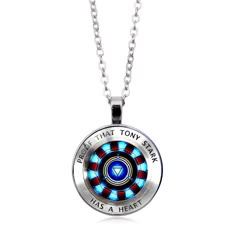 the avengers necklace has an iron man arcor symbol on it and is glowing blue, red