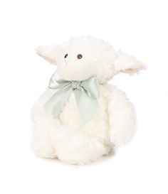 a white stuffed animal with a light green bow