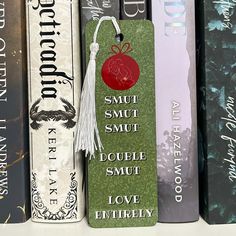 🎄 Bookish Christmas 🎄 Happy Tuesday, book lovers! 📚 I have a handful of Christmas Bookish Merch available on my shop! The Naughty Readers Book Club Aluminum bookmark was supposed to go live last year, but life happened 🤣 Christina @christinas_reading did an AMAZING job making the naughty reader. I also updated The Smut Smut Smut, Double Smut Bookmark design. Swipe to get a closer look at all the designs 🤩 💭 Have you decorated for Christmas? I haven’t and I don’t think I will. Before yo... Bookmark Design, Bookish Merch, Christmas Happy, Happy Tuesday, Embroidered Tshirt, Book Lovers Gifts, One Sided, Book Lover