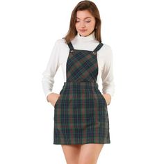 Add a versatile layer to your new-season wardrobe with this suspender dress. Features all over plaids and adjustable shoulder straps. Simple and classic design with above knee-length and a-line silhouette. Pair perfectly with your favorite t-shirts or sweatshirt for a casual look. Occasion: Weekend Gathering, Dating, Party, School, Meeting Friends, etc. Plaid Overalls, Green Clothing, Bib Dress, Button Decor, Suspender Skirt, Tartan Dress, Suspender Dress, Pinafore Dress, Overall Dress