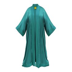 Introducing our Teal Satin Kaftan Abaya, a luxurious addition to your wardrobe. This elegant piece features long flowing sleeves and a loose, comfortable fit. Crafted from sumptuous satin, it's perfect for various occasions. Pair it with a slip dress and heels for a chic and sophisticated look, or dress it down with jeans and sneakers for a stylish and comfortable ensemble. Whichever way you choose to wear it, be prepared to capture everyone's attention and turn heads wherever you go. Cold Machine Wash Silk Long Kaftan For Formal Occasions, Fitted Silk Long Kaftan, Long Silk Fitted Kaftan, Fitted Long Silk Kaftan, Satin Kaftan, Ceremonial Clothing, Flowing Sleeves, Kaftan Abaya, Kick Flare Jeans