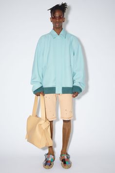 <div>Midi shoulder bag is adorned with twisted musubi knots on each side, inspired by traditional Japanese obi sashes. Crafted from soft leather, detailed with an embossed Acne Studios logo.</div> Short Cuir, Winter Fit, Model Pose, Belted Trench Coat, Fashion Logo, Leather Shorts