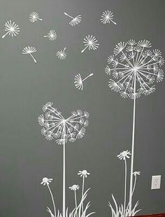 an image of a dandelion wall decal on the side of a room