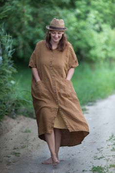 "PAINTER linen dress | button up linen dress | breastfeeding friendly Each item is individually cut and sewn by order, especially for you. Handmade, quality items take time, please allow approx.4 weeks for your order to be made. Thanks so much for your patience. ABOUT THE ITEM: *100% pure linen *laundered *Colour: GINGER BROWN (medium weight linen) *half sleeves *straight silhouette, is made to be loose *two big patch front pockets *button up *coconut buttons *can be made custom length (from the Brown Linen Dresses With Pockets, Linen Lagenlook Maxi Dress With Relaxed Fit, Oversized Linen Beach Dress With Pockets, Lagenlook Linen Maxi Dress With Relaxed Fit, Lagenlook Linen Beach Dress, Lagenlook Beach Dress With Pockets, Beach Lagenlook Dress With Pockets, Linen Tunic Dress With Pockets, Bohemian Linen Dresses With Pockets