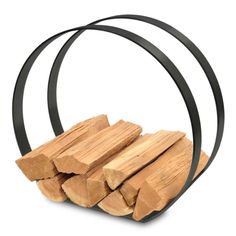 several pieces of wood are stacked in a circular holder with black metal straps on an isolated white background