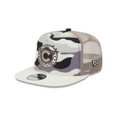 the new era camo trucker hat is available in white, black and grey