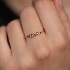 A stacking ring with ruby in 14K solid gold. A dainty 3 stone ring for women with natural gemstones.  100% handcrafted with love! * Material: 14K solid white gold, 14K yellow gold * Gemstone: Ruby, round cut * Gemstone's Weight: 0.06 ct HOW TO ORDER * Choose from the drop-down menus the available options (Ring size, Material) and leave us a note for any special requirements. PRODUCTION TIME - SHIPPING POLICIES * Please keep in mind that each item is handcrafted, and we need 5 days at least for its production. If you need your order on a specific date, please contact us. * All orders are shipped worldwide via FedEx Express for speed and security. The estimated delivery time is 3 days to the US and Europe and 5 days to anywhere else. * All our pieces are delivered beautifully packaged and gi Three Stone Ruby Ring In 14k Yellow Gold, Fine Jewelry Ruby Gemstone Stackable Rings, 14k Gold Fine Jewelry Stackable Ruby Ring, 14k Gold Stackable Ruby Ring Fine Jewelry, 14k Gold Stackable Ruby Promise Ring, Promise Stackable 14k Gold Ruby Ring, Stackable 14k Gold Ruby Ring For Promise, Dainty Three Stone Yellow Gold Ring, 14k Gold Stackable Ruby Ring In Fine Jewelry Style