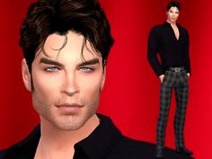 a male in a black shirt and plaid pants