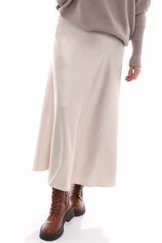 Make a statement with the Made in Italy Ottilie Skirt! Featuring a luxurious silk like fabric and elasticated waistband, the skirt is perfectly simple yet stylish. Don't miss out on this essential piece this season! - Elasticated waistband - Silk like fabric Luxury Lined Beige Maxi Skirt, Beige Relaxed Maxi Skirt With Gathered Details, Chic Non-stretch Beige Maxi Skirt, Cotton A-line Maxi Skirt With Gathered Detail, In Italy, Trousers, Skirt, Silk, Italy