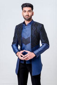 Electric blue full sleeve open jacket, highlighted with contrast beads embroidery and attached nehru jacket. Paired with an inner kurta and trouser.
Components: 3
Pattern: Embroidery
Type Of Work: Beads
Neckline: Stand Collar
Sleeve Type: Full Sleeves
Fabric: Raw Silk
Color: Blue
Other Details: 
Bead embroidered nehru jacket
Occasion: Sangeet,Cocktail and Reception - Aza Fashions Raw Silk Embroidery, Layer Jacket, Embroidery Beads, Kurta Set For Men, Beads Embroidery, Nehru Jacket, Open Jacket, Nehru Jackets, Beaded Neckline