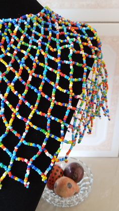 African Beaded wedding necklace, Zulu Cape necklace, Beaded shawl necklace, Christmas gift for her, Women jewelry, Bridesmaid gift This beaded bib necklace is superbly crafted which can be worn with any outfit at different occasions and it will absolutely makes you stand out. Main color - multicolor. The necklace can be available in different colors. Wholesale available at a fair price,please contact me. For any clarification,please send me a convo or an e-mail. Thank you for visiting and happy Multicolor Beaded Bib Necklace As Gift, Multicolor Bib Necklaces With Dangling Round Beads, Multicolor Bib Necklace With Dangling Round Beads, Multicolor Bib Necklace With Round Dangling Beads, Multicolor Tiny Beads Bib Necklace For Gift, Multicolor Large Beads For Celebrations, Festive Multicolor Beaded Necklaces With Tiny Beads, Festive Multicolor Tiny Beaded Necklaces, Gift Colorful Beads Bib Necklace