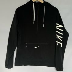 Nike Hoodie Top Nwot Super Lightweight Black Size Xs But Runs Very Big/Roomy Front Pocket Hoodie Attached Great For Rainy Days Sporty Long Sleeve Activewear With Logo For Streetwear, Long Sleeve Activewear With Logo Print For Streetwear, Athleisure Long Sleeve Outerwear With Logo Print, Nike Hoodie Track Jacket For Streetwear, Black Half-zip Hoodie For Sports, Athleisure Hooded Top With Logo Print, Black Long Sleeve Windbreaker For Workout, Nike Black Hoodie With Logo Print, Black Nike Hoodie With Logo Print