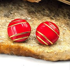 Vintage Estate Designer Signed Monet 90's Red Enamel Earrings Pierced Dome Gold Tone Metal Statement Fashion Costume Jewelry Collectable Size - See picture Great Condition! Please consider the images as an integral part of description. Estate and vintage items normally have been loved and used so pieces may have signs of wear. Earrings may need to be cleaned. You will receive what is pictured Red Vintage Earrings For Valentine's Day, Red Enamel Round Earrings, Red Round Enamel Earrings, Retro Red Round Earrings, Red Retro Round Earrings, Vintage Red Jewelry For Christmas, Retro Red Earrings For Gift, Vintage Red Enamel Earrings, Red Enamel Vintage Earrings