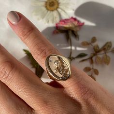 DESCRIPTION The June Birth Flower Signet Ring features one of the most famous and romantic flowers in the world, the rose. Shaped like a vintage saint charm with an intricate rose relief carving and a sparkling diamond, this statement ring is handmade just for you in Los Angeles. Show love to your favorite June baby (or yourself!) with this perfect addition to your everyday collection. Note that this piece is handmade to order. Please allow for a 3-4 week lead time as we craft this special ring. June Birth Flower, February Birth Flowers, May Birth Flowers, Diamond Anklet, Relief Carving, Diamond Signet Ring, Organic Cleaning Products, Special Ring, Show Love