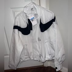 Never Worn, New With Tags! Waterproof, Has Drawstrings To Adjust The Waist And Adjustable Cuffs. Casual White Weatherproof Windbreaker, Nike Casual Waterproof Windbreaker, Nike Windbreaker, Nike White, White Nikes, Nike Jacket, Nike Women, White Black, White And Black