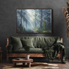 a living room with a couch, coffee table and large painting hanging on the wall