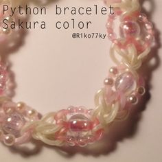 a close up of a bracelet with beads