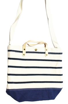 Top handle canvas bag with striped print and shoulder strap. 100% cotton. Length 14.75" height excluding handles 15". Cotton Canvas Shoulder Bag With Top Carry Handle, Cotton Canvas Bag With Top Carry Handle, Everyday Striped Bags With Leather Handles, Cotton Satchel With Canvas Lining Tote Shape, Striped Bag With Leather Handles For Everyday Use, Cotton Canvas Bag With Handles For On-the-go, White Cotton Canvas Bag For On-the-go, Striped Shoulder Bag With Leather Handles For Shopping, White Cotton Shoulder Bag With Leather Handles