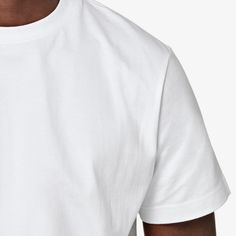 This white crewneck T-shirt boasts a "straight" fit that lends a modern aesthetic to your style. Sport it as a base layer or roll up the sleeves & keep it classic with jeans or shorts. White Polo Shirt, Style Sport, White Crewneck, White Polo, Style Expert, Modern Aesthetic, Mulberry Silk, Base Layer, Roll Up