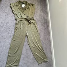 Plus Size Satin Surplice Jumpsuit Size 0x Color Olive Forever 21+ - A Satin Jumpsuit Featuring A Vented Collar, Surplice Neckline, Short Cuffed Dolman Sleeves, Removable Sash Belt, Front Slanted Pockets, Back Jetted Pockets, Back Yoke, And Wide Leg. Content + Care - 100% Polyester - Hand Wash Cold Fitted V-neck Jumpsuits And Rompers By Forever 21, Forever 21 Fitted Jumpsuits And Rompers For Date Night, Jumpsuits Plus Size, Glitter Bodysuit, Plus Size Satin, Mesh Romper, Navy Blue Romper, Black And White Romper, Satin Jumpsuit