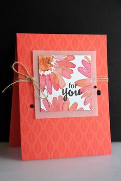 an orange and pink card with some string on it that says i love you for you