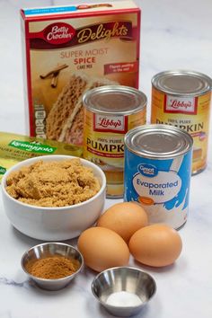 ingredients for cake sitting on a counter top