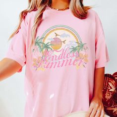 Experience the eternal sunshine and carefree vibes of summer with our Endless Summer Comfort Color Tee. Crafted for those who live for beach days and outdoor adventures, this tee is your go-to choice for endless fun in the sun. Made from premium Comfort Color fabric, our tee offers unparalleled softness and durability, ensuring you stay comfortable whether you're soaking up rays at the beach or exploring coastal trails. The classic "Endless Summer" design captures the essence of perpetual vacati Relaxed Fit Tropical T-shirt For Beach Season, Relaxed Short Sleeve T-shirt For Beach Season, Playful Beach T-shirt For Spring, Playful Short Sleeve T-shirt For Beach Season, Spring Beach Graphic Tee T-shirt, The Endless Summer, Eternal Sunshine, Summer Tee, Fun In The Sun