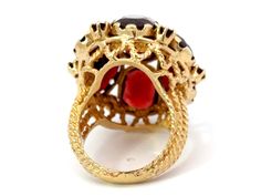 Ring Specifications:Metal: 14k Yellow GoldTotal Weight: 14.9 GramsGemstone: Red GarnetGarnet Carat Weight: ~21 caratsRing Size: 5.5 (resizable)Ring Measurements: 1" x 1"Stamped: "14K"Condition: Preowned, excellent100% Authentic. Please ask all questions before bidding or making a best offer. International Bidders please contact us before bidding for shipping availability and charges. Red Gemstone Flower Ring For Formal Occasions, Formal Red Gemstone Flower Ring, Luxury Oval Gemstone Flower Ring, Formal Oval Flower Ring In Fine Jewelry Style, Oval Flower Ring For Formal Events, Luxury Yellow Gold Oval Flower Ring, Classic Jewelry Pieces, Band Jewelry, Classic Jewelry