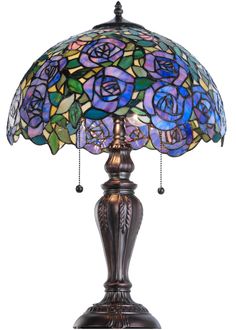 a stained glass lamp with roses on it