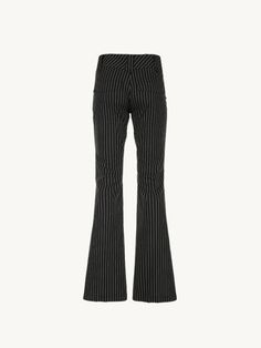 Bring a touch of classic sophistication to your wardrobe with the Winslow Flared Suit Pants. These black high-waisted pants feature an elegant pinstripe pattern, adding a timeless appeal to any look. The flared leg silhouette offers a retro-inspired vibe while flattering your figure. Designed with comfort in mind, the stretchy fabric ensures ease of movement, making them perfect for both the office and casual outings. Whether styled with a sleek blouse or a simple top, the Sophie Pinstripe Flare Flared Suit Pants, Flared Suit, High Waisted Black Trousers, Black High Waisted Pants, Summer Formal Dresses, Pinstripe Pattern, Sophisticated Outfits, Bodycon Dresses Casual, Simple Top