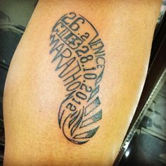 a close up of a person with a tattoo on their leg and the words written in black ink