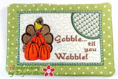 a green and white card with a turkey on it's back, saying gobble til you waffle