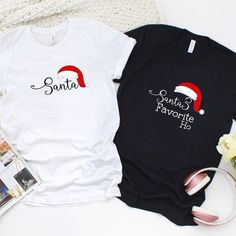 Valentine T-Shirt, Matching Outfits Set, Santa & Santas Favorite Ho Matching Christmas Set Outfits For Couples The T-Shirt, a timeless wardrobe staple, combines comfort with effortless style. Crafted from soft, breathable fabrics, it ensures a cozy fit for everyday wear. Its versatility makes it a go-to choice for various occasions, from casual outings to laid-back evenings. With a range of colors and designs, T-Shirts cater to diverse tastes, allowing self-expression through fashion. The c Outfits For Couples, Shirt Combination, Christmas Long Sleeve Shirts, Santas Favorite Ho, Couple T Shirts, Matching Christmas Shirts, Matching Hoodies, Dashing Through The Snow, Valentine Day Gift