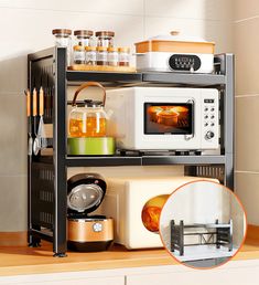 a microwave oven sitting on top of a counter next to a toaster oven and coffee pot