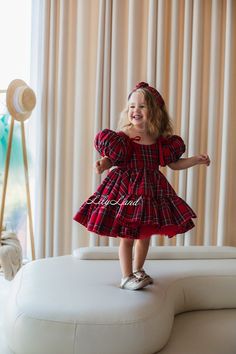 Are you searching for the perfect look for your little fashionista for any special occasion? Our children's dress in checks is the ideal choice! This enchanting dress with puffy short sleeves, flanel ruffles on the skirt, and a delicate bow on the top captivates and adds an unforgettable charm to your little princess's ensemble. Puffy Sleeves: Short sleeves give the dress sophistication and delicacy. Your child will look like a true fairytale heroine! Bow on the top: A delicate small bow adorning the top of the dress adds an unparalleled touch to the look and makes your little princess even more enchanting. Our dresses are crafted with high-quality materials and meticulous attention to detail to ensure comfort and durability. This dress is perfect for various special occasions, including b Weihnachten Outfit, Gown Photoshoot, Baby Girl Gown, Toddler Christmas Outfit, Enchanting Dress, Xmas Outfit, Baby Birthday Dress, Red Tutu