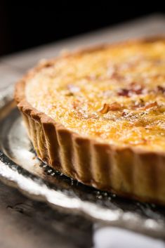 a pie sitting on top of a metal pan