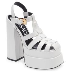 Nwot Versace La Medusa Platform Sandals Heels Material:Genuine Leather Strap Style:Ankle Strap Elevated With A Chunky Block Heel And Stacked Platform, These Statement Sandals Are Topped With Caged Straps, Finished With Tonal Medusa Emblem. Leather Upper Square Toe Adjustable Ankle Buckle Strap Leather Sole Made In Italy Leather-Covered Block Heel, 6" Platform Height, 1.25". Please See Photos, There Are A Few Marks Due To Storing Them. Otherwise In Brand New Perfect Condition. These Are Stunning Fisherman Sandals Women, White Platform Sandals, Statement Sandals, Strappy Platform Sandals, Versace Shoes, Fisherman Sandals, White Platform, Sandal Heels, Platform Loafers