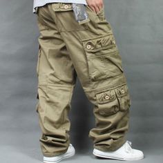 These cargo pants are a great inspiration for anyone who wants cozy trousers. Fashioned of good quality cotton, these mid-waist pants will add style to your look and keep you comfortable throughout the day. The loose-fit pants will complement your hip-hop style in the best way. These pants will get you smiling.