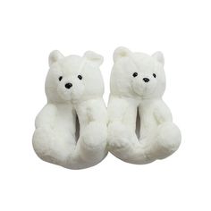 two white teddy bears sitting next to each other