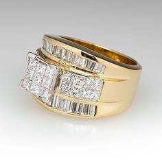 This elegant ring is centered with nine (9), invisible set, princess cut diamonds. The ring is also accented with sixteen (16), invisible set, princess cut diamonds and twenty-three (23), channel set, baguette cut diamonds. The ring measures 15.0mm at the top, rises 10.4mm above the finger, tapering to 7.6mm wide and 1.1mm thick at the base of the shank. This ring is currently a size 7.5. Luxury Princess Cut Ring With Channel Set, Luxury Princess Cut Diamond Ring With Channel Set, Luxury Princess Cut Diamond Ring With Baguette Diamonds, Princess Cut Diamond, Baguette Cut Diamond, Elegant Ring, Channel Set, Diamond Cluster Ring, Baguette Cut