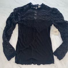 Thanks For Looking At This Great Top By Free People. It Is A Size Xs And Is New With Tags. Lace Top And Ribbed Bodice. Bust 30" Length 23" Fitted Top With Lace Sleeves For Night Out, Black Long Sleeve Lace Top For Layering, Black Fitted Tops With Lace Sleeves, Fitted Black Tops With Lace Sleeves, Black Crew Neck Top With Lace Trim, Fitted Crew Neck Top With Lace Sleeves, Crew Neck Lace Tops For Night Out, Stretch Lace Trim Tops For Date Night, Fall Date Night Tops With Lace Trim