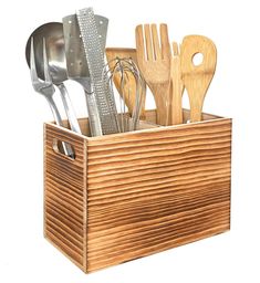 a wooden utensil caddy with spoons and spatulas in it