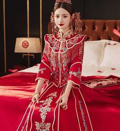 ⭐ Premium Handmade Item, Chinese Traditional Design for Brides who wants Red Wedding Celebration. ⭐ Item High Light: Classical Red Color; 4D Solid Tailor to Show Bride's Shape Beauty; Premium Satin Material Surface; Embroidery Sequins Pattern; Tassel jewelry decoration in front Chest and Sleeves/ Hemline; Tassel Satin with Pattern Skirt; Symmetrical Art design to show the beauty of Chinese Royal Wedding Fashion. ⭐ Made for Spring/Summer/ Autumn Season; Clothing Match Tips: Match to Loose Qipao J Symmetrical Art Design, Bridal Vibes, Surface Embroidery, Symmetrical Art, Bridal Suit, Traditional Asian Dress, High Heel Stiefel, Pattern Skirt, Dress Embroidery