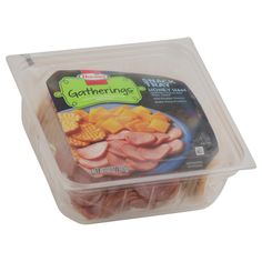 a plastic container filled with meat and cheese