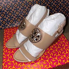 Brand New No Tags Brand: Tory Burch Style: Wedge Sandals Gender: Women's Color: Tan/Rose Gold Sizing: Usa Country: Brazil Heel Height: 2.5'' Toe Shape: Open Upper Material: Leather Luxury Summer Wedge Sandals With Block Heel, Beige Wedge Sandals With Padded Heel, Luxury High Heel Wedge Sandals With Padded Heel, Luxury Wedge Sandals With Block Heel And Heel Strap, Luxury Wedge Sandals With Heel Strap And Block Heel, Luxury Wedge Sandals With 4-inch Heel For Spring, Luxury Spring Wedge Sandals With 4-inch Heel, Designer Wedge Heels With 4-inch Heel, Luxury 4-inch Heel Wedge Sandals For Spring