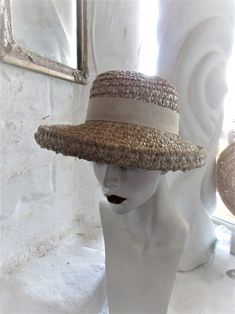 "STYLISH BEIGE 60's SUN HAT This stylish hat is a fashion statement that would work for any era--a good choice for an afternoon garden party, wedding or day at the races...or a stroll down the sidewalk! It is well made despite no maker's label, in a color that will go with almost anything. It has a hatband of beige with a 2 tone grosgrain ribbon in brown and beige at the back and would be ideal for brown spectator pumps. A vintage treasure to last another lifetime or 2! Very good to excellent co Adjustable Brimmed Retro Boater Hat, Retro Adjustable Brimmed Boater Hat, Vintage Adjustable Hat Bands For Vacation, Retro Wide Brim Sun Hat For Summer, Retro Wide Brim Summer Hat, Retro Brimmed Sun Hat For Summer, Vintage Cream Hat Bands With Flat Brim, Retro Summer Hat With Curved Brim, Retro Wide Brim Hats For Vintage Events