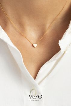 This piece looks gorgeous when layered with other VE/O pieces or worn delicately on its own. Steeped in symbolism, it makes a great gift for someone you love whether that be for an anniversary, graduation or Bat Mitzvah.  Available in your choice of 14K yellow, rose or white gold plated rhodium, you will be tempted to get one of each for every occasion. Everyday Yellow Gold Heart Necklace With Heart Detail, Everyday Yellow Gold Heart Necklace, Simple Everyday Heart Charm Necklaces, Minimalist Everyday Heart Charm Necklaces, Minimalist Everyday Heart Charm Necklace, Everyday Minimalist 14k Gold Heart Necklace, Minimalist Yellow Gold Heart Necklace For Everyday, Simple Everyday Heart Pendant Necklace, Simple Yellow Gold Heart Necklace For Everyday