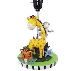 a toy giraffe and other animals on a stand