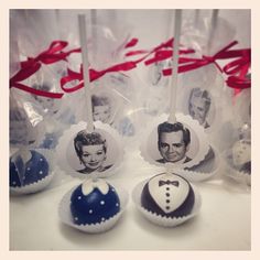 four cake pops decorated with pictures of the same man and woman in blue, white and red