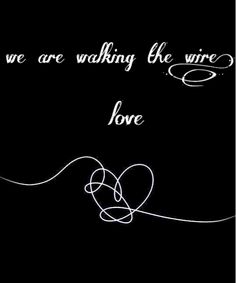 a black and white photo with the words, we are walking the wire to love